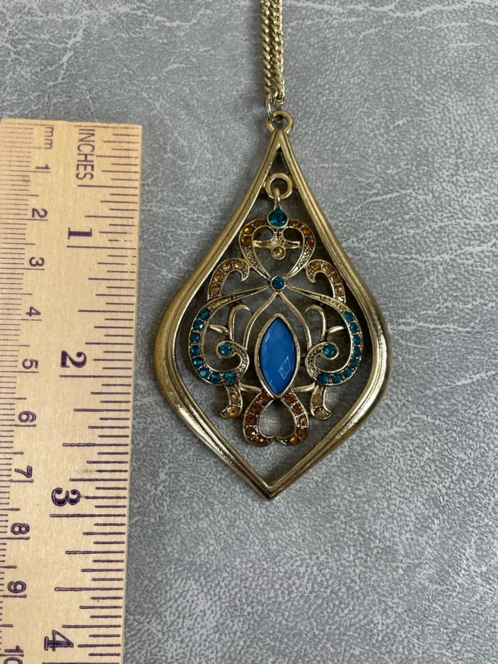 Charming Charlie Gold-Tone Teardrop Necklace with Blue and Amber Accents